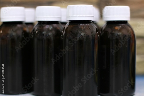 bottle with syrup for children from temperature