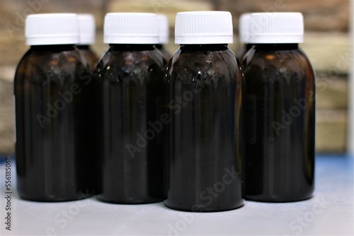 bottle with syrup for children from temperature