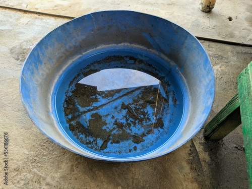 Wallpaper Mural photo of puddles on plastic round tray Torontodigital.ca