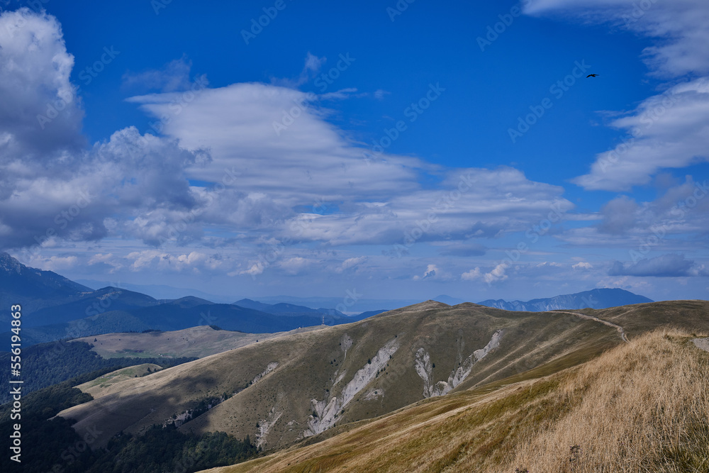 Mountain landscape.
Beautiful sunny day in the mountains.
Low clouds in mountains
Carpathian mountains in Romania