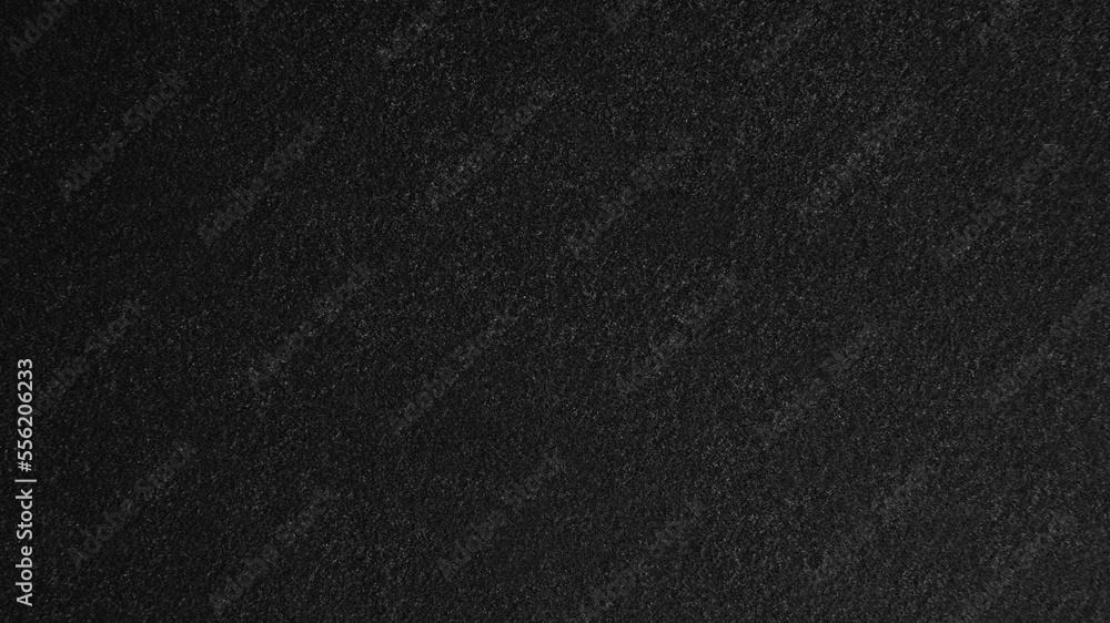Black sand texture, close-up, background surface Black sand texture, close-up, background surface