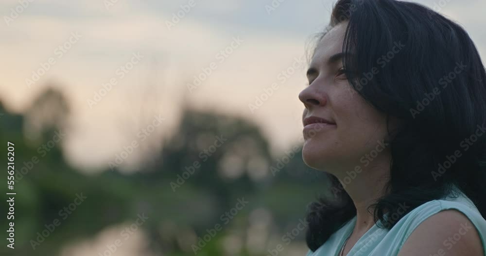 Happy Woman Enjoys Rest Relax on Nature Near River. Summer Season Sunset. Rural Country Scene 4K Happy Woman Enjoys Rest Relax on Nature Near River. Summer Season Sunset. Rural Country Scene 4K