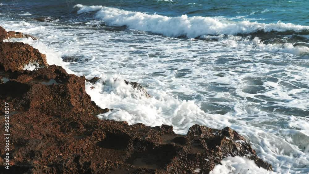 Huge ocean waves reaching rocky coast, crashing and splashing. Amazing seascape Huge ocean waves reaching rocky coast, crashing and splashing. Amazing seascape