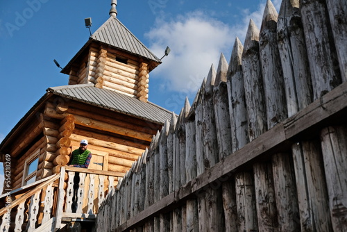 Yalutorovsk, Russia - 06.03.2018 : Wooden building on the territory of an ancient historical settlement. photo