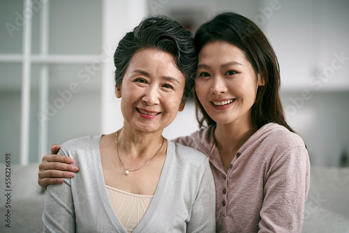 portrait of asian senior mother and adult daughter