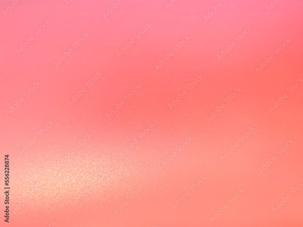 Pink red gradient background with reflected light the color as Valentine’s Day