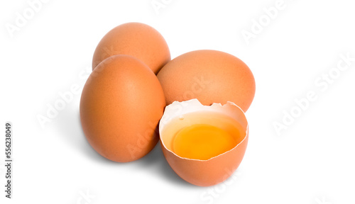 fresh organic chicken eggs and half-broken eggs with yolk isolated on white background