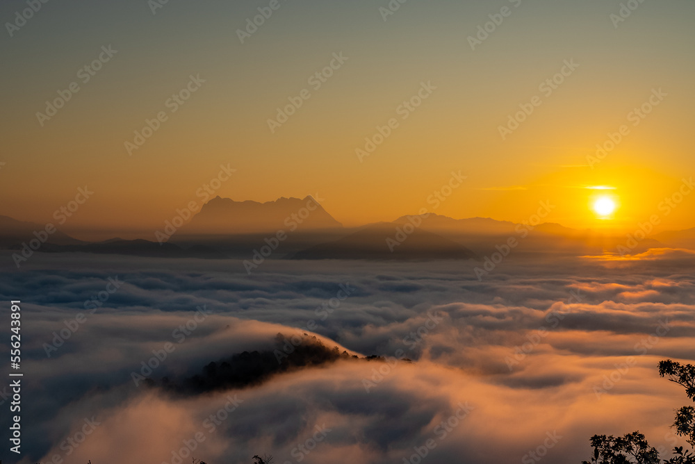 Majestic view of Doi Luang Chiang Dao in northern Thailand, the third highest mountain in Thailand, seen with beautiful dramatic clouds and colorful sky Majestic view of Doi Luang Chiang Dao in northern Thailand, the third highest mountain in Thailand, seen with beautiful dramatic clouds and colorful sky