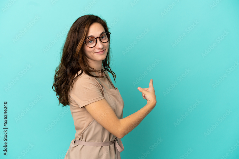 Restaurant waiter pointing back Restaurant waiter pointing back