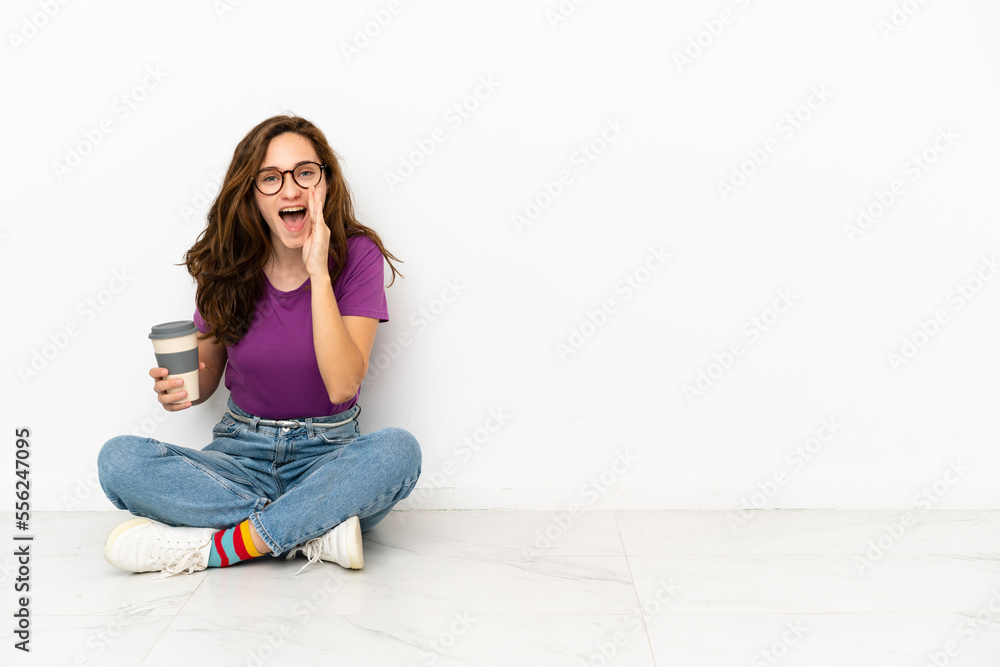 Young caucasian woman isolated on white background shouting with mouth wide open Young caucasian woman isolated on white background shouting with mouth wide open