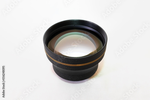 Teleconverter lens for a camera close-up on a white background