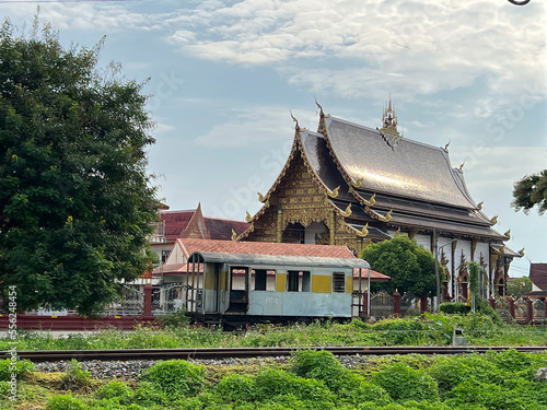 budhist temple near the rails and the trainstation in inlampang thailand