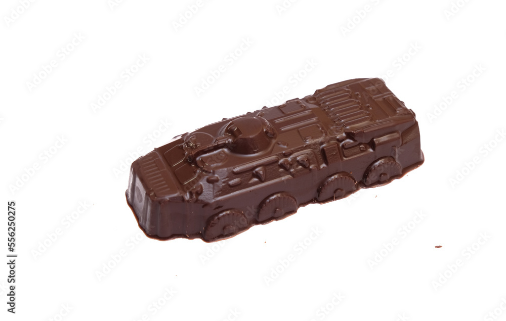 figurine tank made of milk chocolate on a white background figurine tank made of milk chocolate on a white background