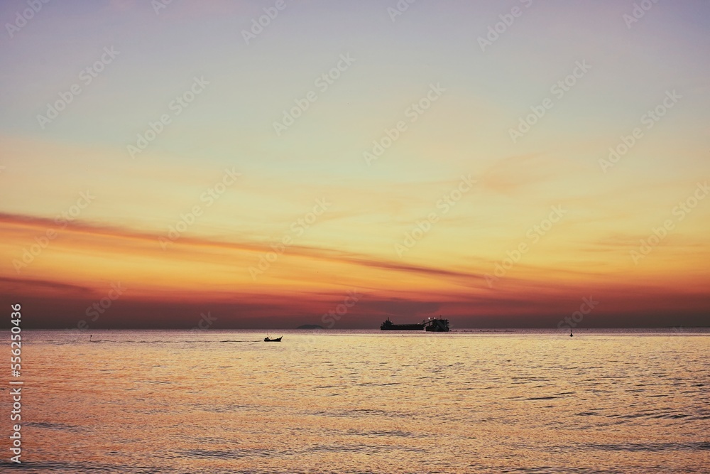 silhouette, ship and boat on sea at evening, 