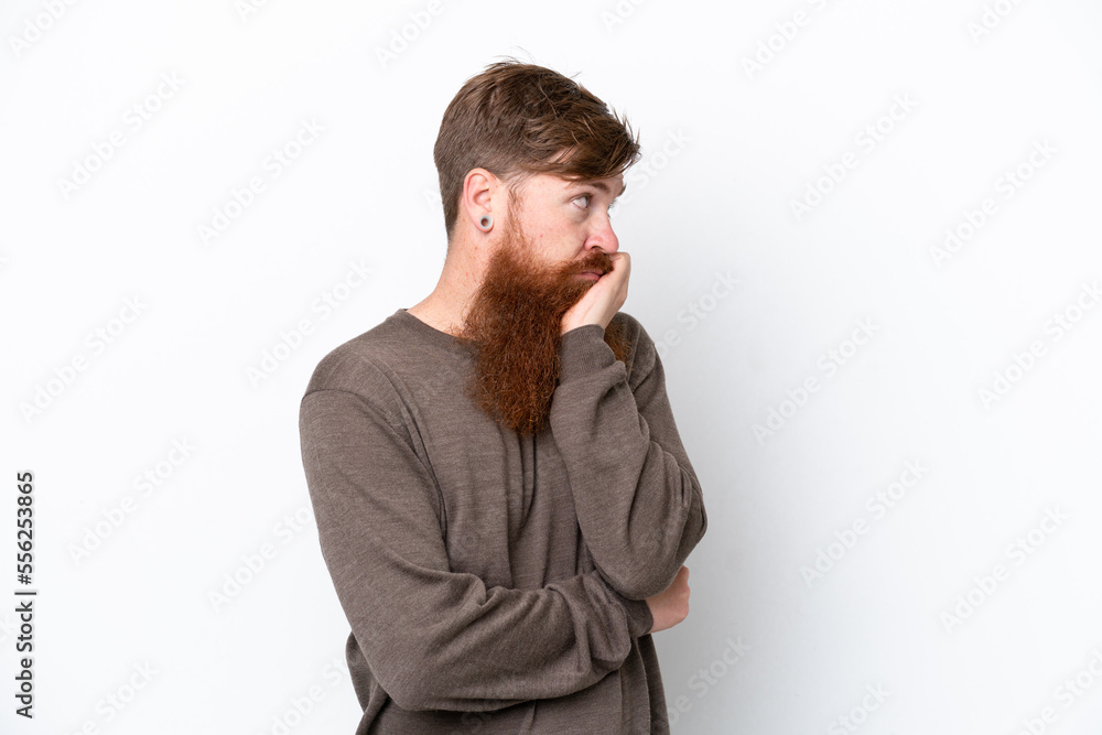 Redhead man with beard isolated on white background with tired and bored expression Redhead man with beard isolated on white background with tired and bored expression