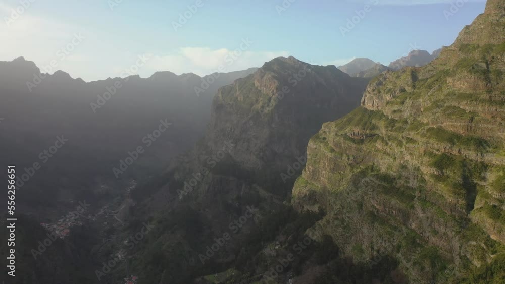 Aerial views from the viewpoint called Miradouro Eira do Serrado in Madeira, Portugal on a beautiful spring evening. Aerial views from the viewpoint called Miradouro Eira do Serrado in Madeira, Portugal on a beautiful spring evening.