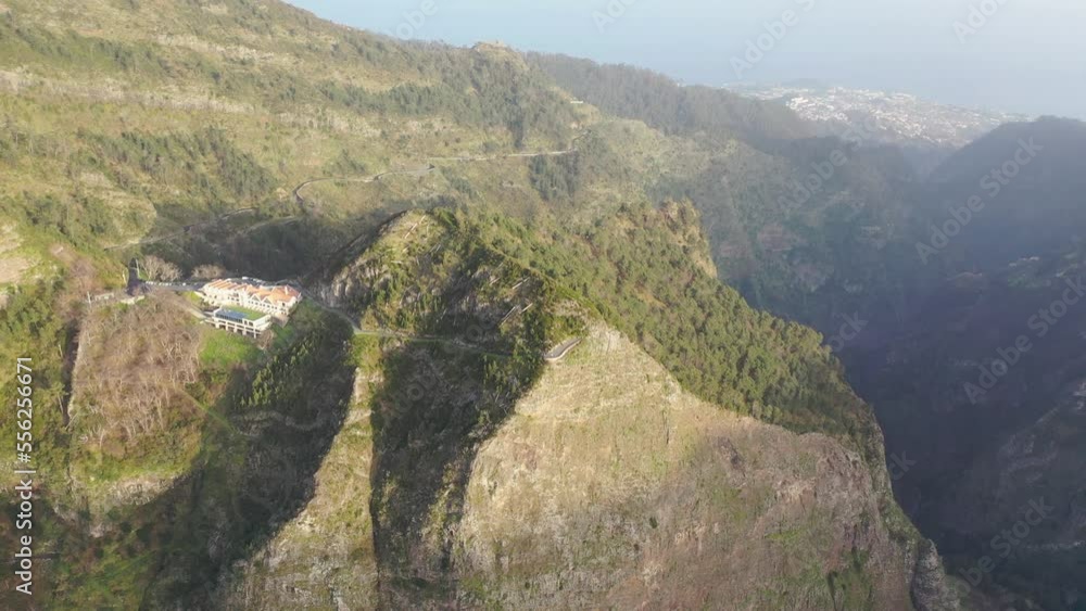 Epic aerial view over a canyon on the island of Madeira in Portugal. The trees thrive here very well because of the climate. Epic aerial view over a canyon on the island of Madeira in Portugal. The trees thrive here very well because of the climate.