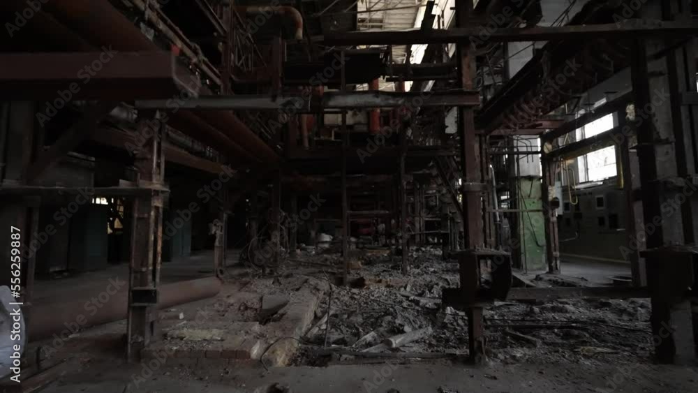 The interior of the destroyed production in the factory since the days of the Soviet Union. Dolly camera shot The interior of the destroyed production in the factory since the days of the Soviet Union. Dolly camera shot