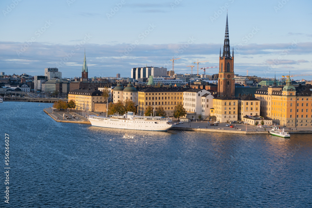 Boat stays at Lake Mälaren near Riddarholmen Church in Stockholm, Sweden