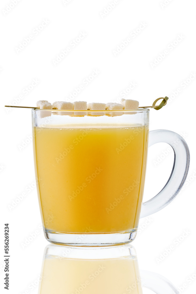 Hot non alcohol drink with orange juice and coconut milk