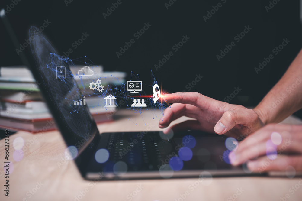 Cybersecurity and privacy concepts to protect data. Lock icon and internet network security technology. Businessman protecting personal data on smart phone with virtual screen interfaces.