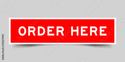 Red color square label sticker with word order here on gray background