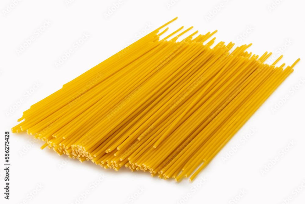 Typical italian bucatini pasta, big perforated spaghetti isolated on white Typical italian bucatini pasta, big perforated spaghetti isolated on white