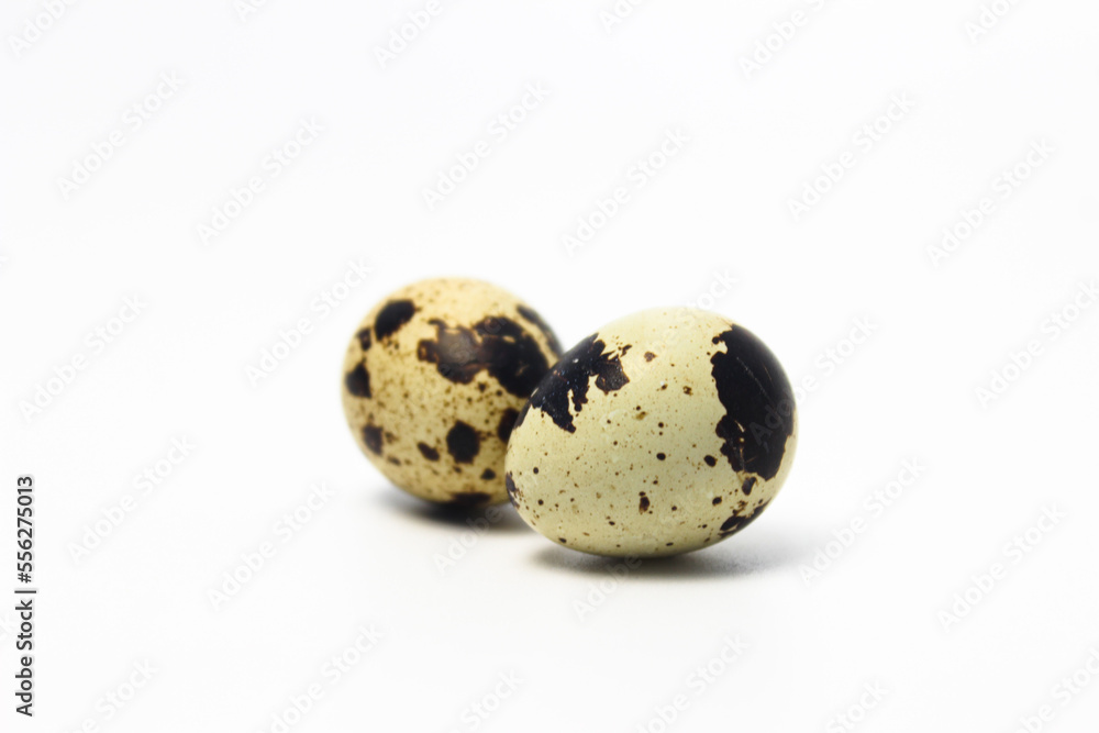 Quail Eggs Kissing Each Other, Pareidolia Effect on Quail eggs. Isolated on White Quail Eggs Kissing Each Other, Pareidolia Effect on Quail eggs. Isolated on White