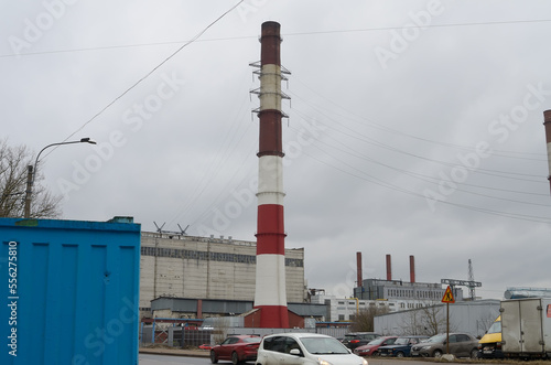 Industrial building of the fuel power plant with a pipe