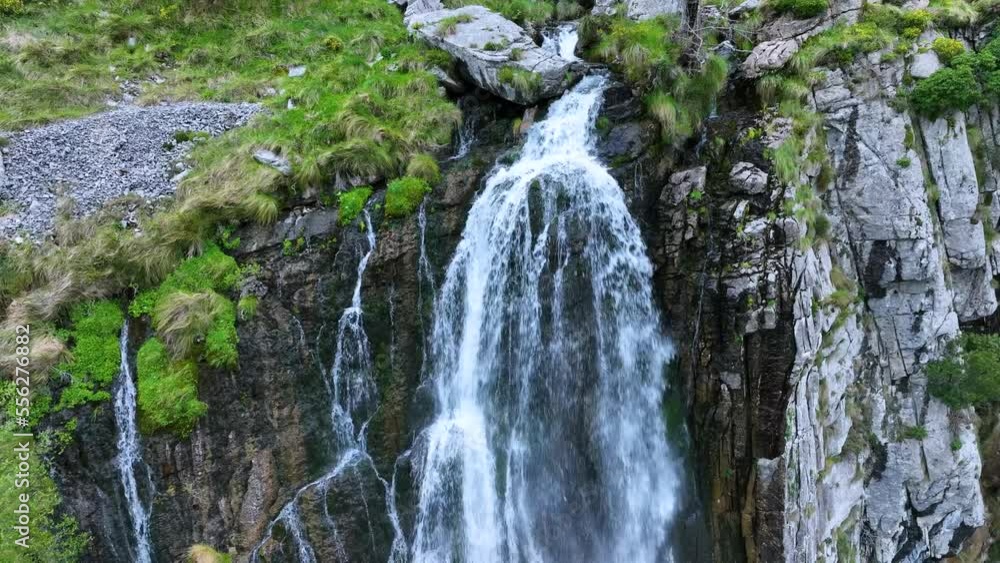 Ason waterfall seen from a drone. Hills of the Ason Natural Park. Soba Valley, Cantabria, Spain, Europe Ason waterfall seen from a drone. Hills of the Ason Natural Park. Soba Valley, Cantabria, Spain, Europe