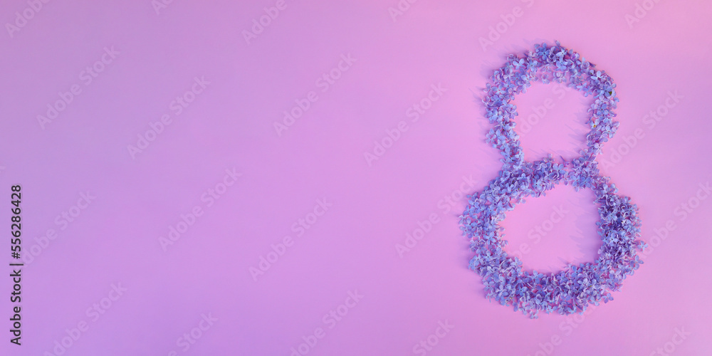 Figure 8 made of flowers on pink background. Happy International Womens Day celebrate on March, congratulatory card Figure 8 made of flowers on pink background. Happy International Womens Day celebrate on March, congratulatory card