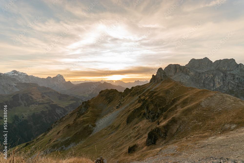 Majestic sunset scenery from the top of the Balmer Graetli region at the Klausenpass in Switzerland Majestic sunset scenery from the top of the Balmer Graetli region at the Klausenpass in Switzerland