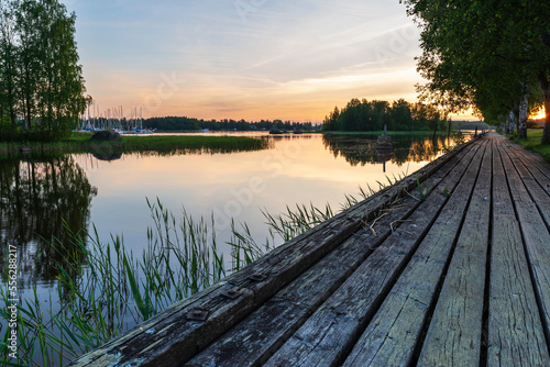 Wooden pier leading towards the horizon. Jakobstad/Pietarsaari, Finland.