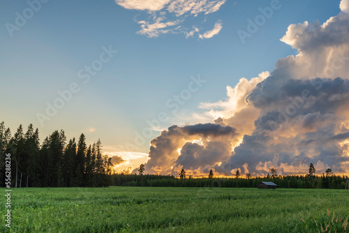 Dramatic clouds over a field. Finland.