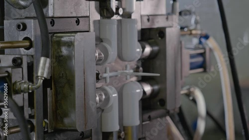 Injection molding machine for plastic products during operation. Technology for the production of plastic products from polypropylene.