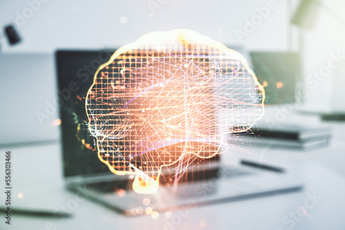 Creative artificial Intelligence concept with human brain hologram on modern laptop background. Multiexposure © Pixels Hunter