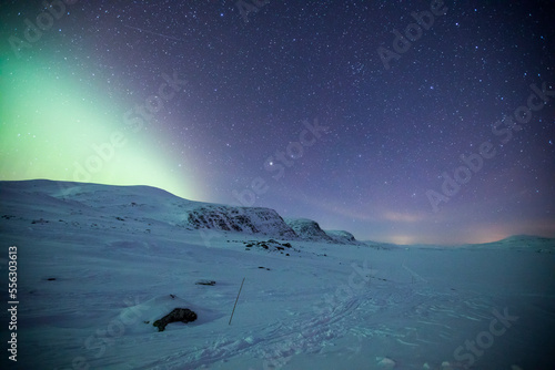 Northern lights in Reinheim Cabin, Dovrefjell National Park, Norway photo