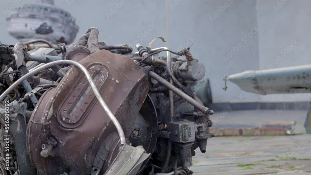 Detail of a burned out helicopter. Remains of a destroyed Russian Air Force combat helicopter Hind Crocodile. Engine rotor, blades, tail, wreckage of a crashed combat helicopter close-up. Detail of a burned out helicopter. Remains of a destroyed Russian Air Force combat helicopter Hind Crocodile. Engine rotor, blades, tail, wreckage of a crashed combat helicopter close-up.