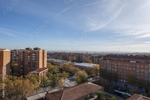 Views of building facades and roofs of the city on a sunny winter day