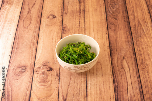 Wakame is an edible seaweed. In Japan it is used in the preparation of miso soup