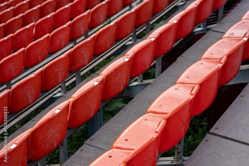 Obraz premium top view of the rows of seats in the stadium, orange seats for spectators