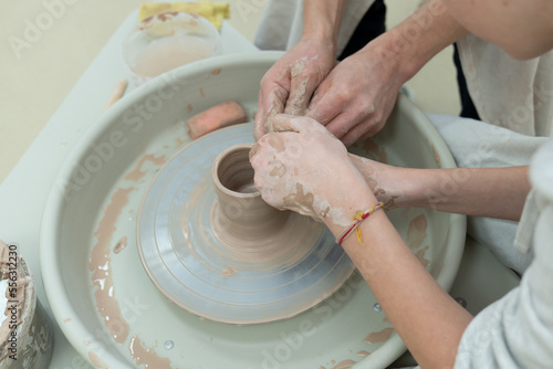 The concept of hobbies and hobbies, all-round development of children and adults. Close-up of hands working with clay. The concept of hobbies and hobbies, all-round development of children and adults.