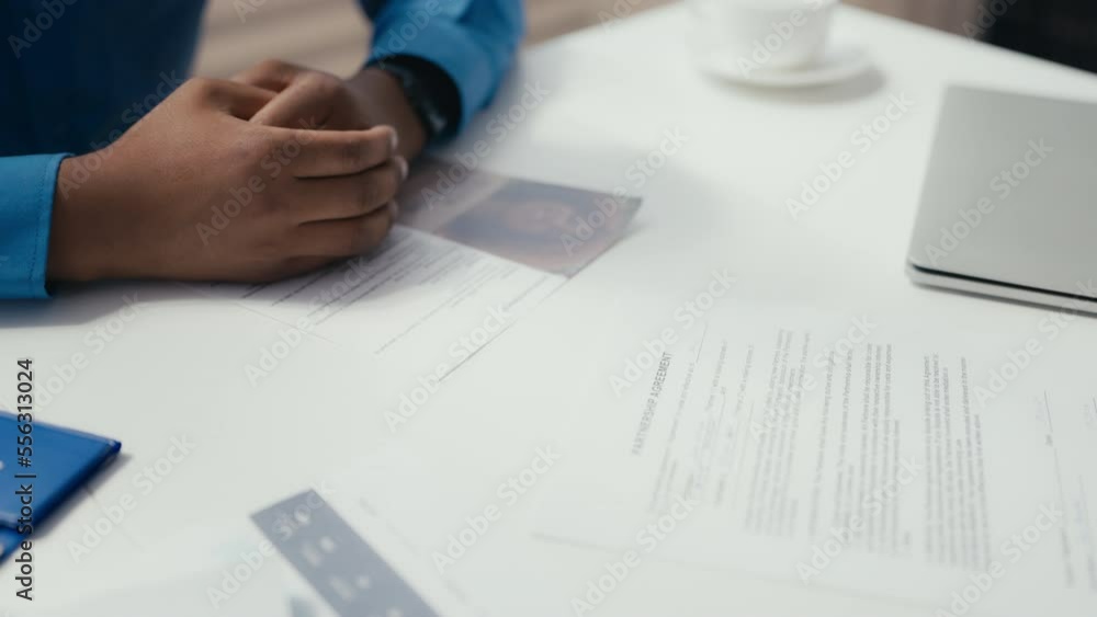 Job candidate signing papers, being hired, employment agreement, partnership