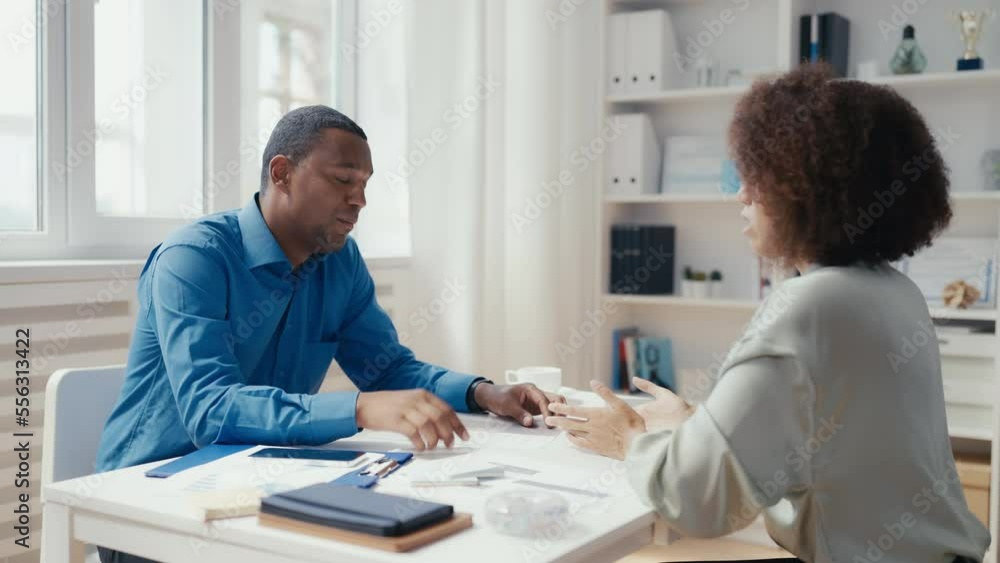HR interviewing woman for a job, discussing necessary skills for position HR interviewing woman for a job, discussing necessary skills for position