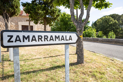 traffic signpost pointing the way to Zamarramala, municipality of Segovia, Castile and León, Spain photo