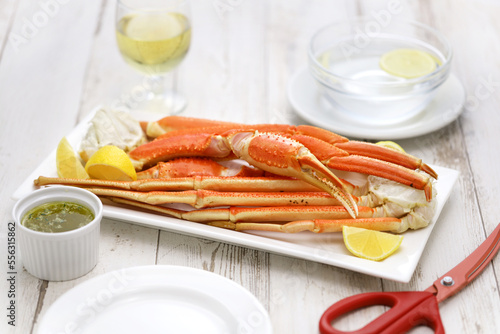 snow crab legs with garlic butter sauce photo