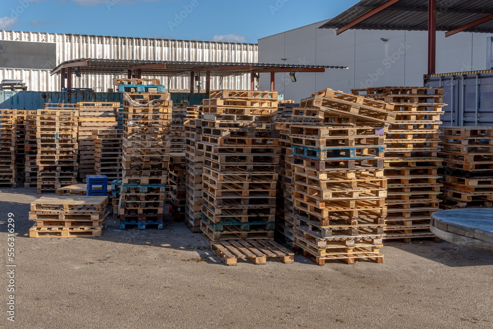 Wooden pallets stacked without merchandise Wooden pallets stacked without merchandise