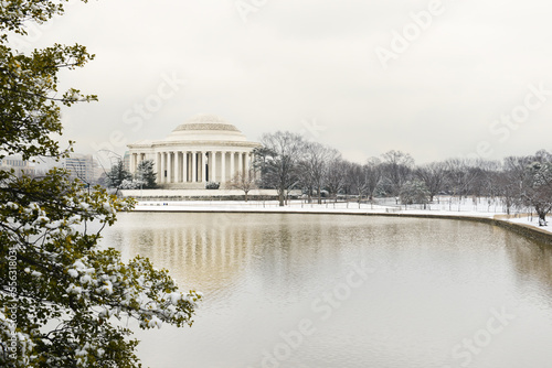 Washington DC in the snow - Jefferson Memorial and snow covered cherry trees at tidal basin - Washington DC United States