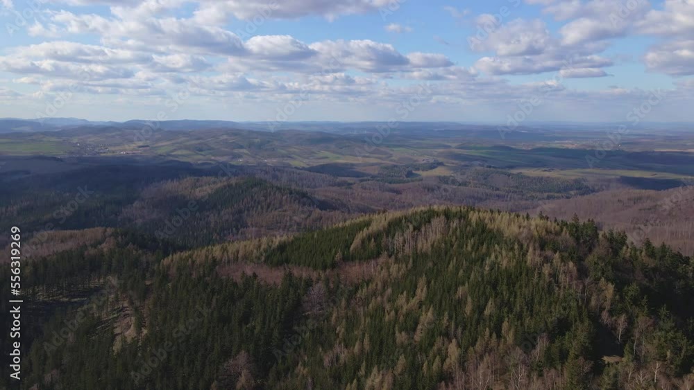 Aerial birds eye view of beautiful mountains covered with evergreen forest at sunny autumn day. Nature landscape with mountains ranges and valleys Aerial birds eye view of beautiful mountains covered with evergreen forest at sunny autumn day. Nature landscape with mountains ranges and valleys
