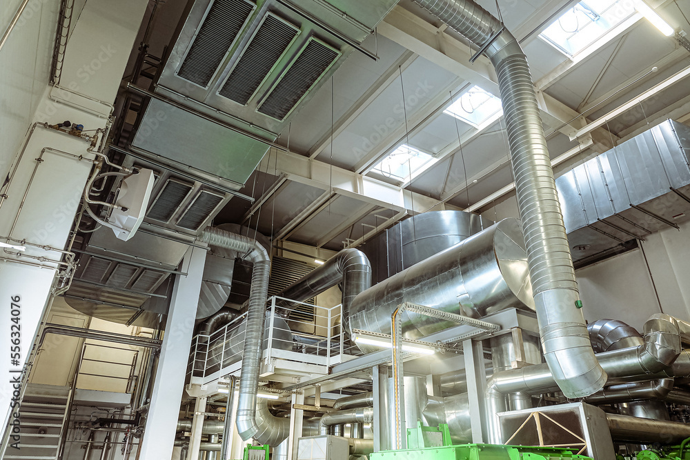 Galvanized round and rectangular ventilation gas ducts in an industrial building. Engineering air system. Galvanized round and rectangular ventilation gas ducts in an industrial building. Engineering air system.
